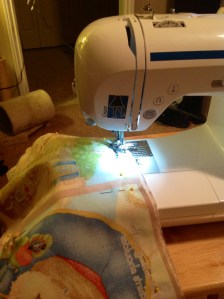 Most books print an outline around the pages to cut along, allowing you to use that as your guide to sew your book with a 1/4" seam. 